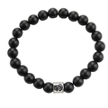Black matte stone bead bracelet with silver Capricorn zodiac charm on white background - Capricorn