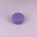 Single purple macaron-shaped cosmetic container on a pink surface for creams and balms - 10 g / Purple