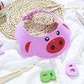 Pink pig-shaped baby shower cap with adjustable snaps and ear protection for hair washing - Cartoon Pig Pink