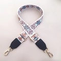 Detail of adjustable floral fabric strap with gold metal hooks and bohemian pattern - Blue Circles + Black Leather