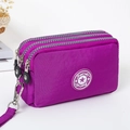 Paarse nylon canvas mini portemonnee met drie ritsen en een duurzame polsband - Lila Klein