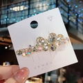 Sparkling butterfly hair clip with clear K9 crystals and metal base in a variant style - Single Piece / White