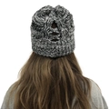 Detail of knit beanie with unique back ponytail hole and cross stripe weaving design - Black and White Mixed