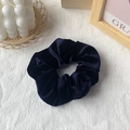 Velvet hair scrunchie in navy blue with elegant crinkle texture on white fabric - Navy Blue