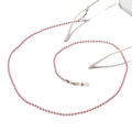 Detailed spiral view of pink beaded sunglasses chain with golden lobster clasps and loops - Pink