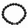 Detail of 8mm matte black stone bead bracelet featuring silver Cancer zodiac sign charm - Cancer