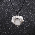 Macro shot of silver heart pendant with white bead on black wax cord necklace - White (Clear Crystal)