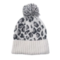 Close-up of leopard print knit pattern and fluffy pompom detail on the beanie - One Size / White