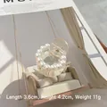 Elegant round pearl hair claw clip in transparent acrylic, size 3.6cm by 4.2cm - 7# 11 Rounds - 4cm