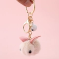 Cute white plush rabbit keychain with gold bell and ring on soft pink background - Animal Keychain / Off-white Bunny