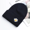 Black knitted beanie hat with white daisy embroidery and fold-over cuff design - Navy Blue