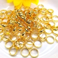 Polished 14k gold-filled jump rings for jewelry making on a minimalist white surface - Outer Diameter 6mm / 18K Gold