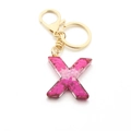 Pink glitter resin keychain with letter X shape and golden lobster clasp hardware - Pink Sequin / Letter X