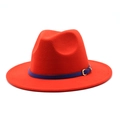 Detail of red wool fedora hat featuring a navy leather band and golden metal buckle clasp - Orange Red