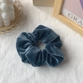 Dark blue velvet scrunchie hair accessory on a decorative white textured background - Grey Blue