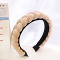 Macro detail of hand-woven beige velvet braided headband with soft texture and inner lining - Beige Braided Headband