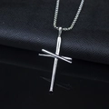 Detailed close-up of a silver stainless steel baseball bat cross necklace pendant - Cross + Stainless Steel Chain