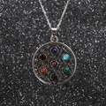 Silver Flower of Life pendant with seven colorful gemstones on black textured background - Flower of Life - Stainless Steel Chain
