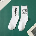 Calze bianche in cotone stile hip-hop con grafica nera e scritte su fondo verde - Taglia unica / Bianco