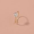 Anello a fiore dorato regolabile con sei strass bianchi su uno sfondo rosa tenue - SE400 (Fiore d'Oro) / Oro