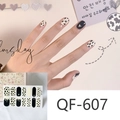 Close-up of cow print and heart nail stickers QF-607 with waterproof matte finish - QF607