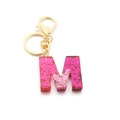 Sparkly resin keychain featuring a hot pink glitter letter M with gold hardware - Pink Sequin / M