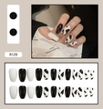 Detailansicht langer quadratischer Kunstnägel im Kuh-Design mit 24er-Set Übersicht - Schwarz Weiß Kuhmuster Stil (R129)