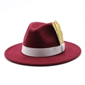 Detail of burgundy fedora hat featuring a white grosgrain ribbon and gold feather accent - Adjustable / Burgundy