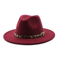 Close-up of wine red fedora hat with leopard print band and golden metal buckle detail - Burgundy