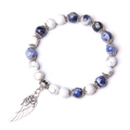 Bohemian beaded bracelet with blue sodalite, white turquoise, and silver rose wing charm - Blue Vein Stone