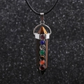 Detailed close-up of a tiger eye hexagonal pendant with seven colorful small gemstones - Tiger Eye Pillar - Wax Cord