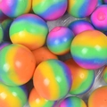 Multiple large rainbow sensory squeeze balls with colorful swirl patterns for stress relief - 12cm / Rainbow