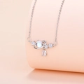 Silver planet necklace with iridescent gemstone and star-shaped cubic zirconia charms - White Gold