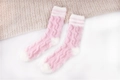 Pink and white striped coral fleece sleep socks with soft cable knit texture - One Size / Pink