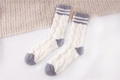 Thick coral fleece striped sleep socks in cream and grey with cable knit texture - One Size / White + Grey Heel