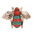 Antique gold bee brooch with red and turquoise rhinestones on white background - Red Blue Rhinestone Bee