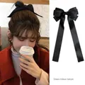 Elegant large black satin bow hair clip with long ribbons for women's hair styling - Ribbon Bow / Black