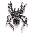 Spider brooch with silver metal finish and blue rhinestones on a white background - LW68 Blue Spider