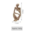 Modern abstract thinker sculpture in beige resin with unique ribbed coil design, 24cm height - Coil Style Thinker Figurine Style B (A17-HP51398)