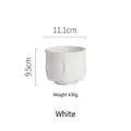 White ceramic face vase with embossed profile art and dimension details for home decor - White Overlapping Face Cup