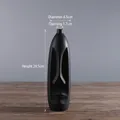 Matte black ceramic face vase in Moai stone statue style for minimalist home decor - Black Large (WX236)