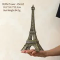 Antique bronze 25cm Eiffel Tower metal model with PARIS engraving held in hand - Bronze - 25CM Tower