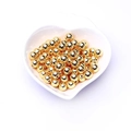 Polished 14k gold-filled round spacer beads for jewelry making in a heart-shaped bowl - 18k Gold Filled