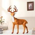 Realistic spotted brown reindeer Christmas ornament standing in a cozy home setting - New Round Horn Deer 50cm High