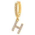 Macro view of gold hoop earrings with sparkling zircon-studded letter H pendant - Letter H / Gold