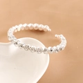 Elegante bracciale elastico con diamanti in metallo argento su piatto a cuore bianco - Strass a fila singola