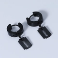 Detail of black huggie hoop earrings with razor blade pendants in polished finish - Earrings / Black