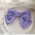 Elegant purple satin oversized bow hair clip on a ceramic plate with white lace background - Spring Clips / Light Purple