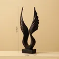 Moderne abstrakte Engelsflügel-Skulptur aus mattschwarzem Harz, Höhe 42,5 cm - Schwarz-Flügel zum Erfolg