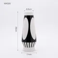 Moderne schwarz-weiße Keramikvase mit geometrischem Muster und einer Höhe von 29 cm - 29x6.5x11cm